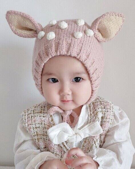 Ziory Knitted Cap with Tie-Knot & Applique