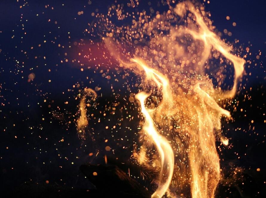 Closeup shot of flames of a bonfire in the darkness