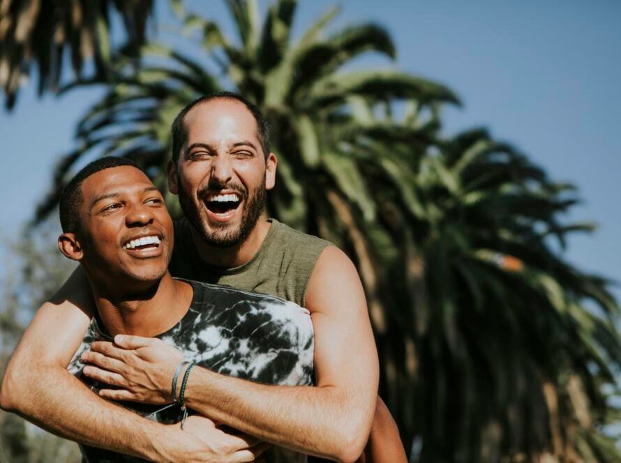 Gay couple hugging in the park