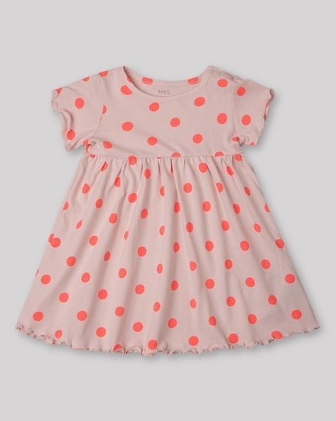 Pink dress with short sleeves and red polka dots.