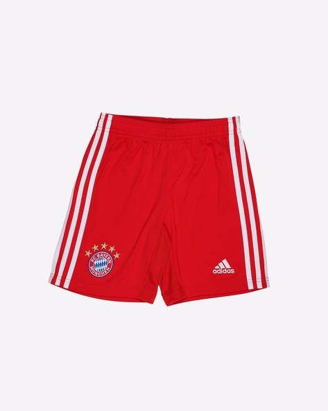 Red football shorts with white stripes, featuring the FC Bayern Munich logo and Adidas branding.